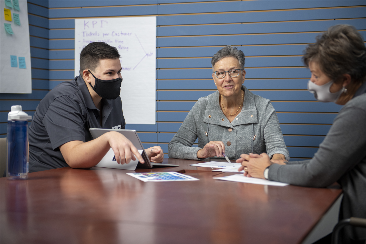 Staff members in a meeting